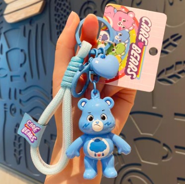 Unlock The Magic Keychain Figurine - Grumpy Bear